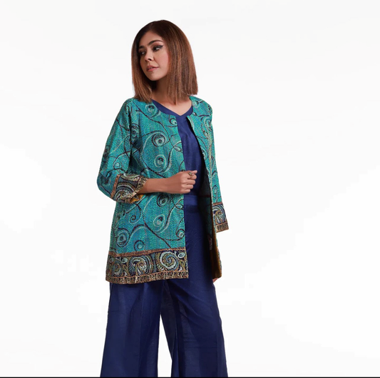 Electric Blue Sleeveless Shirt with Kataankari Coat and Loose Bottoms.